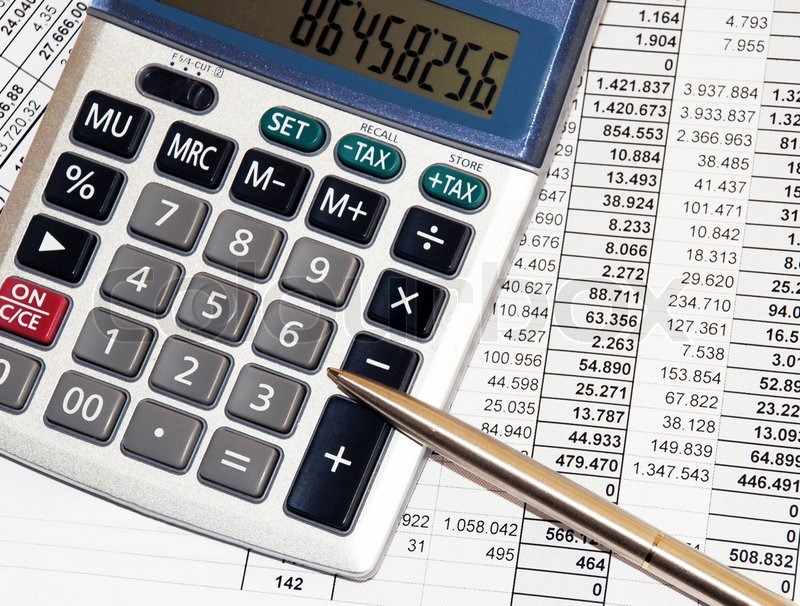 1663803-silver-calculator-with-pen-and-calculations-numbers-on-paper